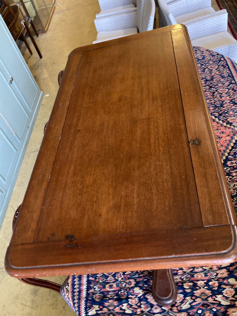 A Victorian mahogany adjustable reading table, width 82cm, depth 40cm, height 70cm